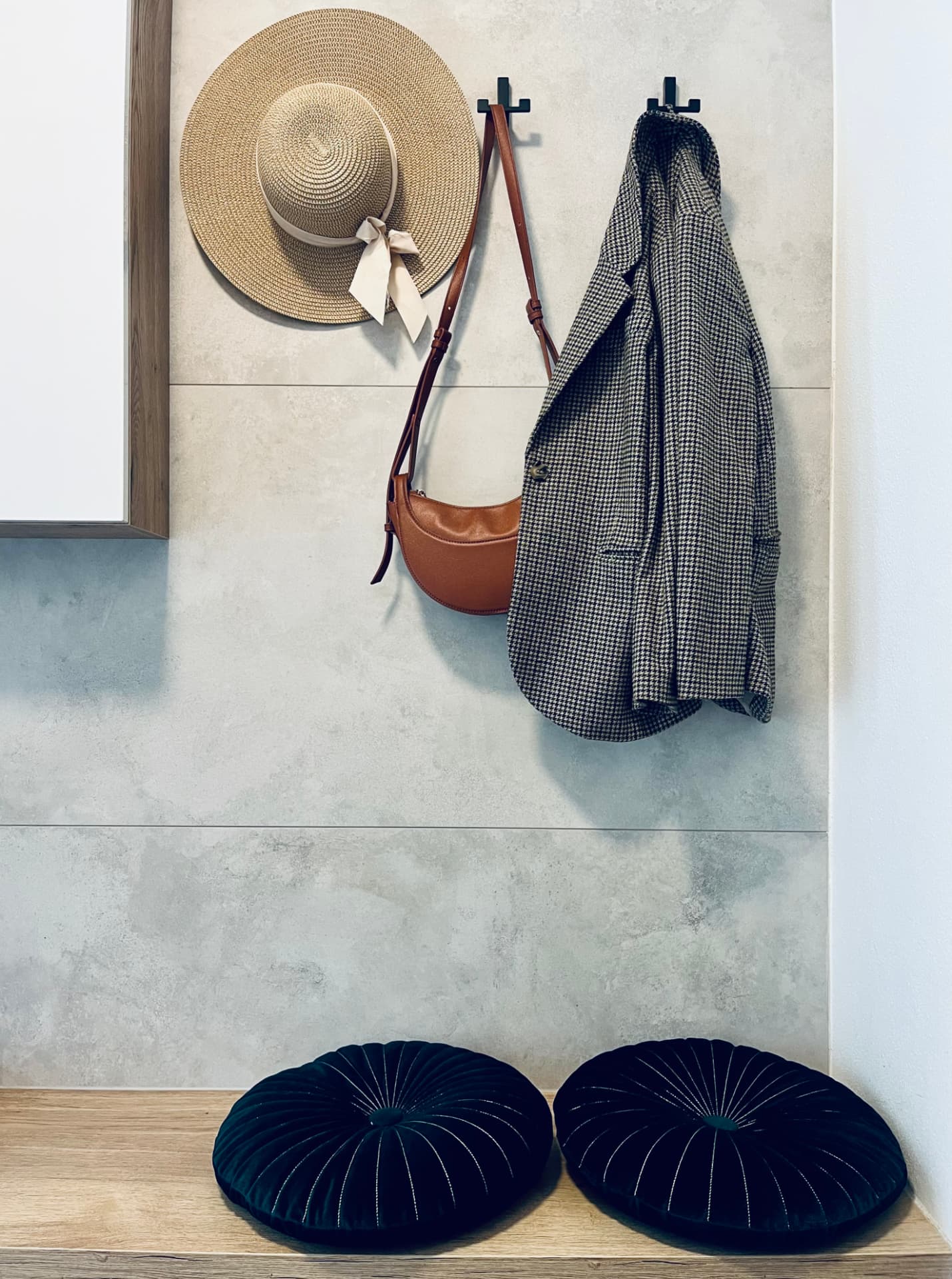 Hat, coat and bag on the hall hooks