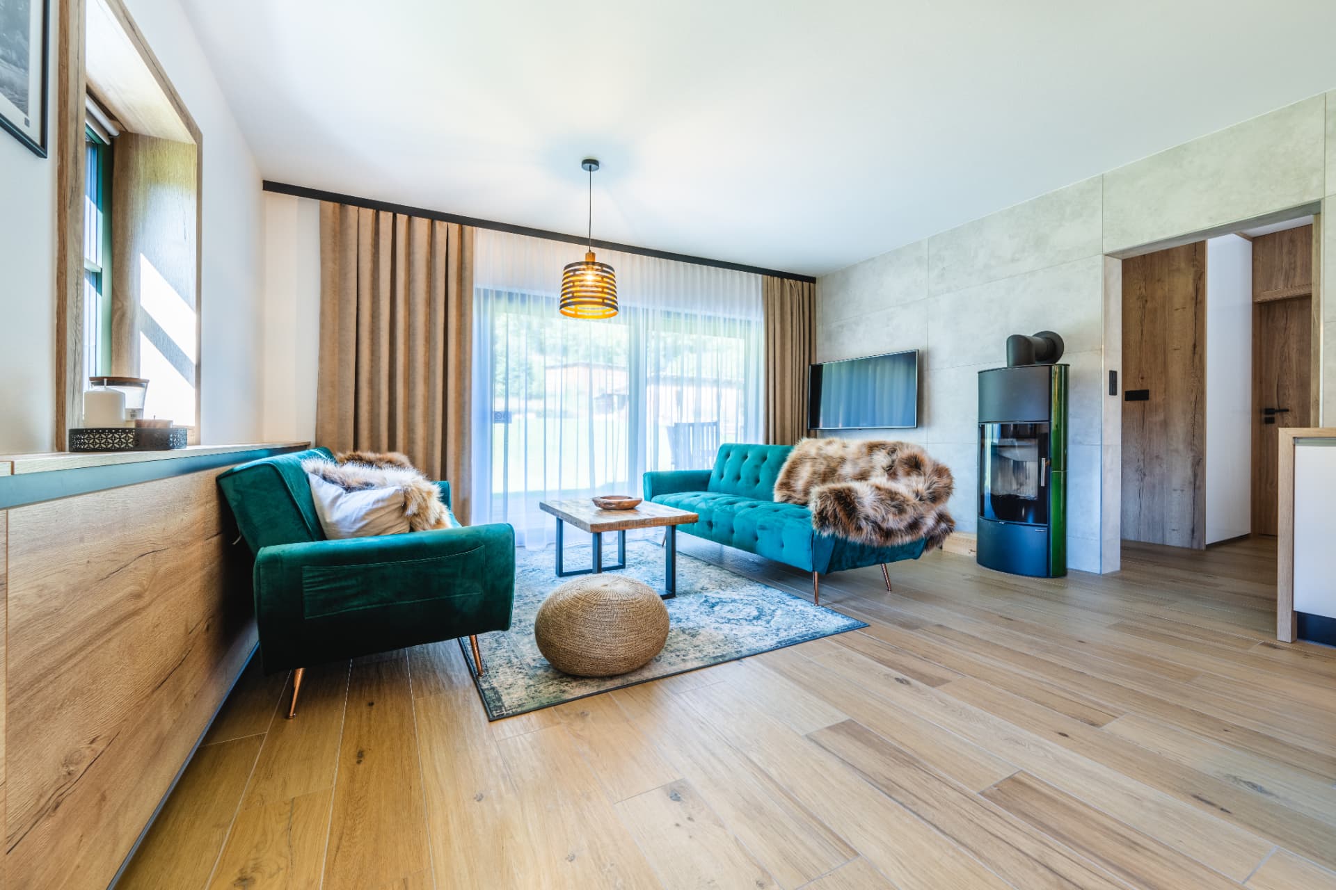 Living room with a wood stove in the lower apartment